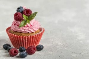 front view view tasty cupcake with strawberry cream scaled 1